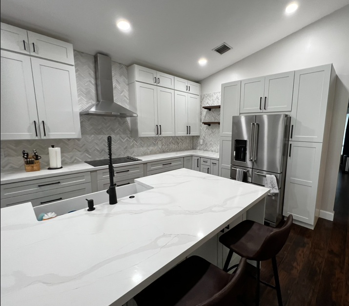 Modern grey kitchen with stainless appliances