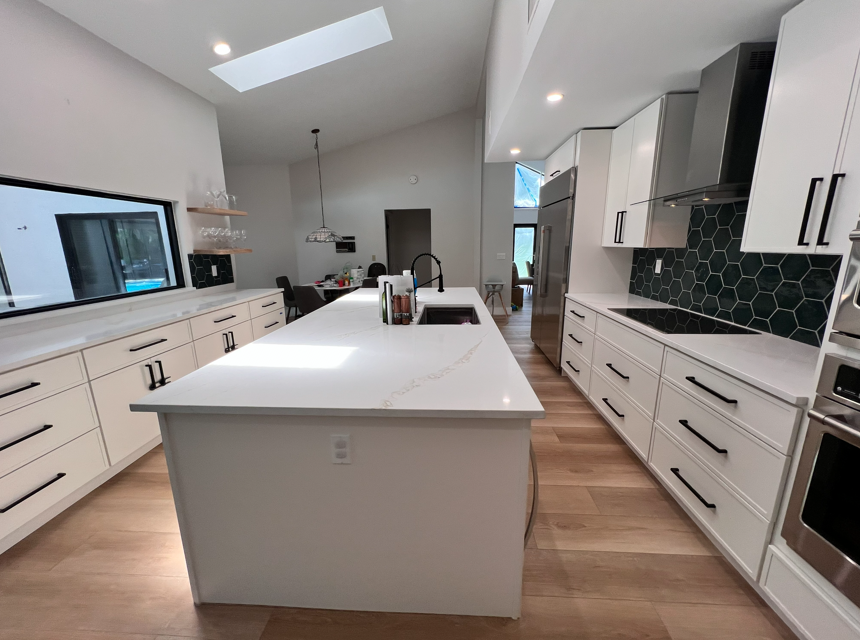 Bright white quartz island kitchen